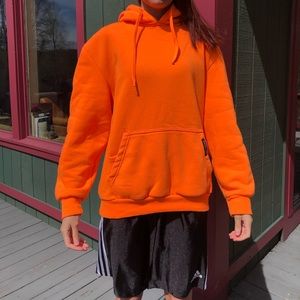 Bright orange hoodie/sweatshirt
